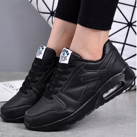 Black Women's Lace-Up Air Cushion Sneakers — Sinead Cushioned Lightweight Sporty - Worn Lifestyle Front