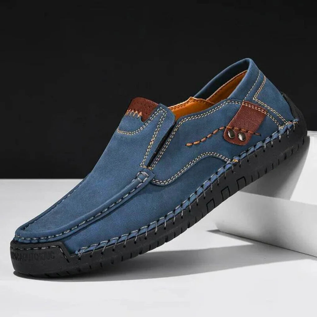 Blue Men's Slip-On Shoes With Arch Support — Salma Hand-Stitched Moc Toe Loafers - Front Side Angle