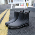 Black Men's Ankle Rain Boots — Finn Everyday Slip-On Waterproof - Outdoor Street Pose