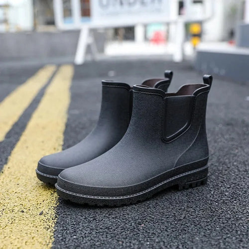 Black Men's Ankle Rain Boots — Finn Everyday Slip-On Waterproof - Outdoor Street Pose