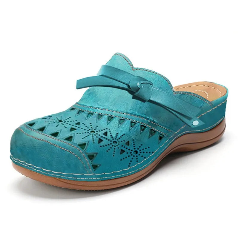 Lake Blue Women's Perforated Wedge Clogs — Indigo Cushioned Buckle-Strap Cutout