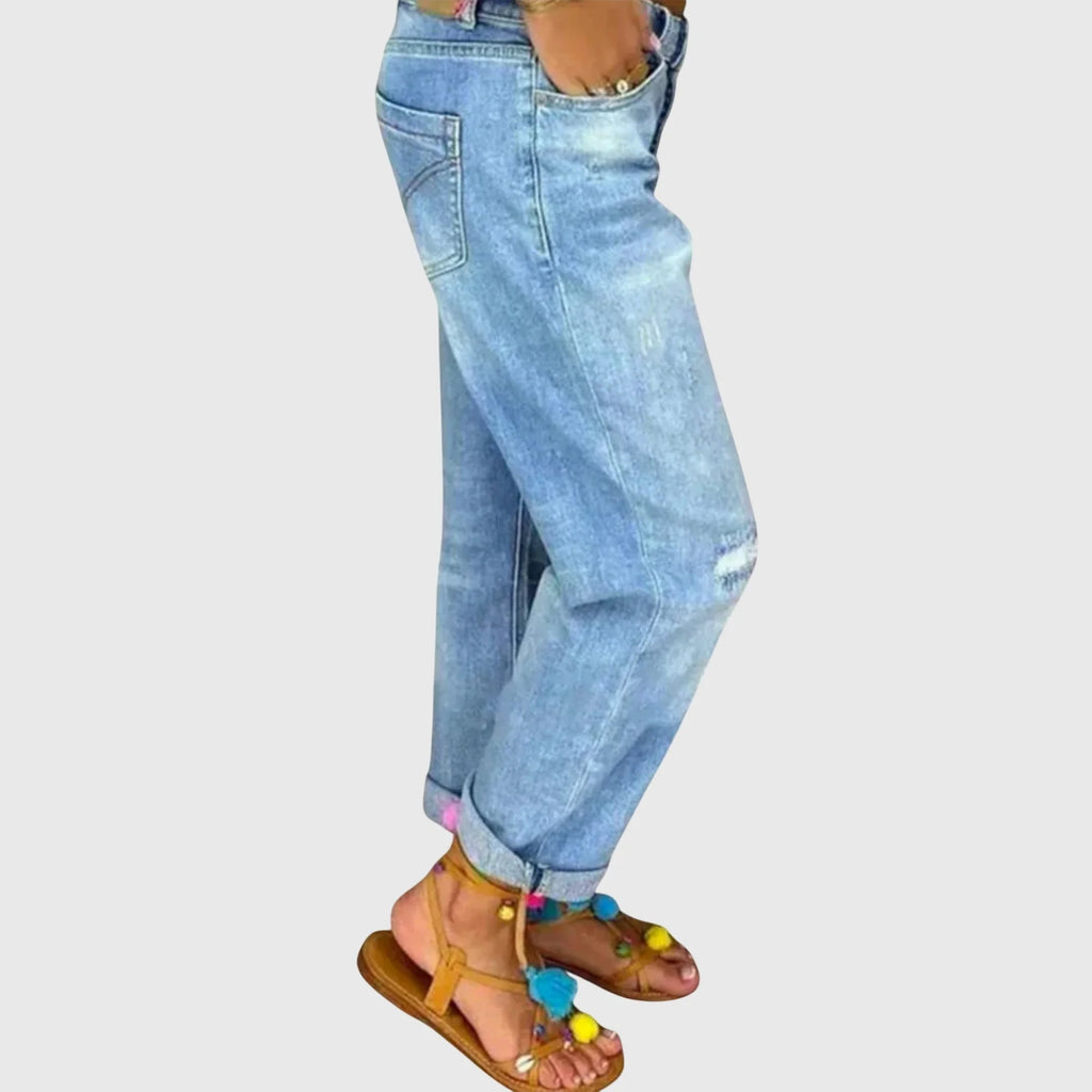 Light Blue Women's Blue Distressed Boyfriend Jeans — Annie Button-Fly High-Waisted Ripped - Side Pose