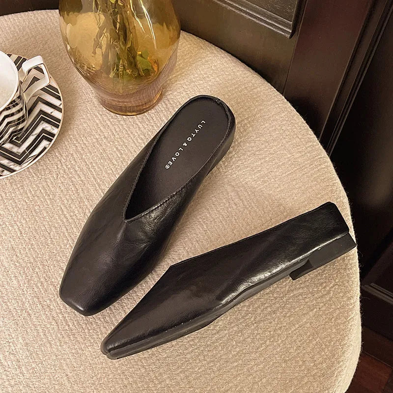 Black Women's Square-Toe Leather Ballet Flats — Vivienne Leather V-Cut Slip-On - Flat Lay Ottoman