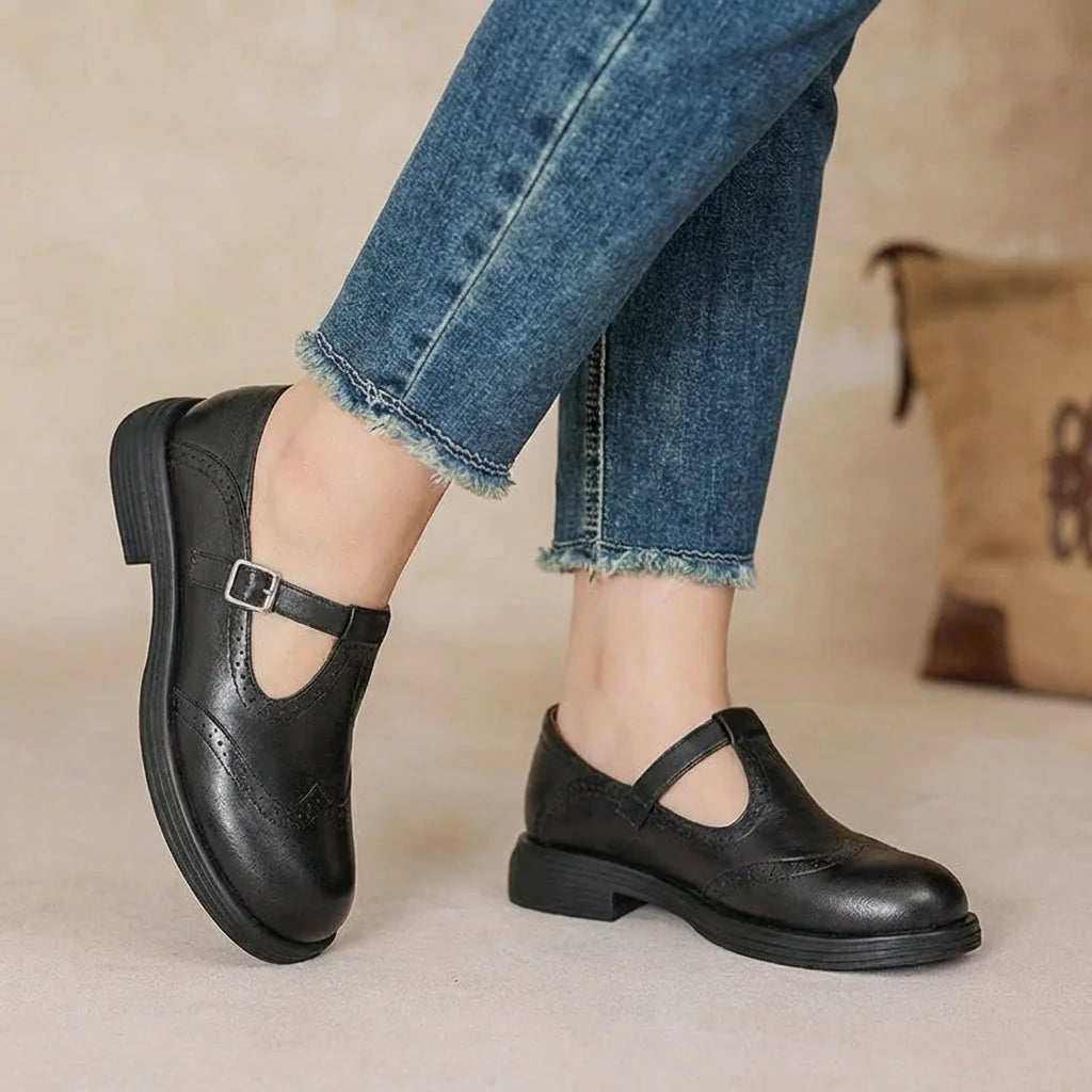 Black Women's Leather Mary Janes — Ariana Cushioned Vintage T-Strap Buckle - Side Worn Denim
