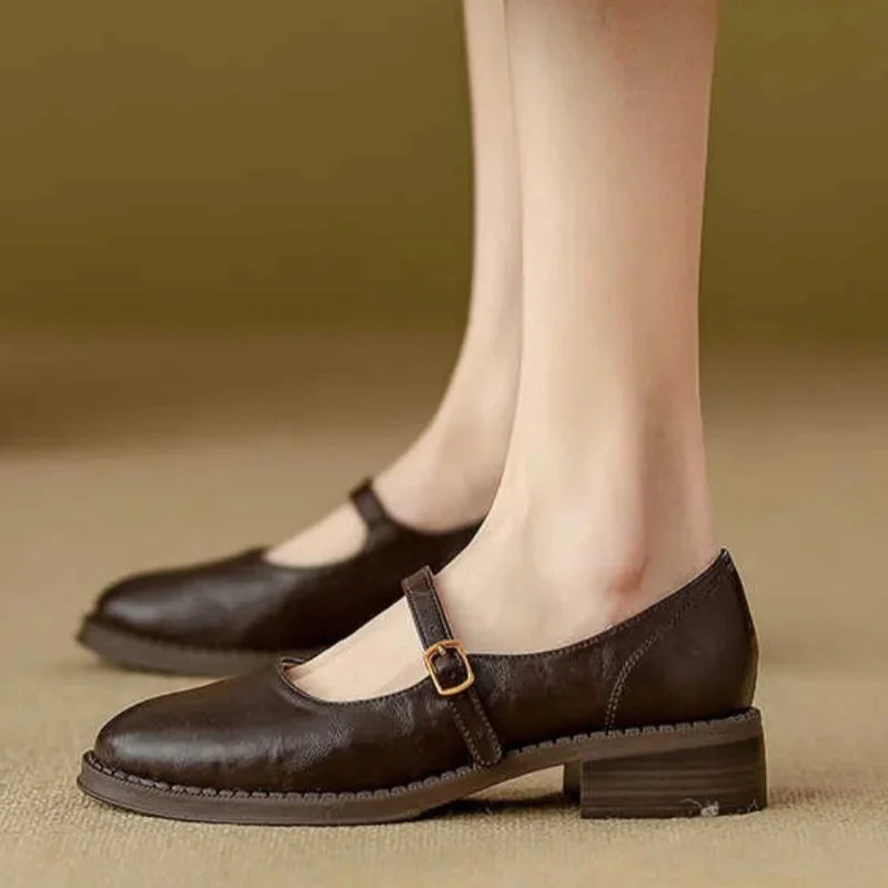 Brown Women's Leather Mary Janes — Nia Buckle-Strap Round-Toe Block Heel - Side Profile Worn