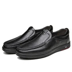 Black Men's Leather Slip-On Shoes — Edward Cushioned Moc-Toe Business Loafers - Studio White Pair