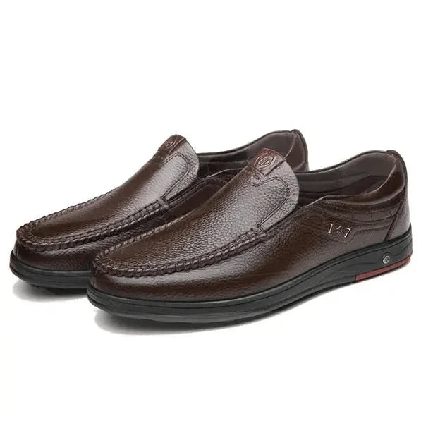 Brown Men's Leather Slip-On Shoes — Edward Cushioned Moc-Toe Business Loafers - Studio Angled Pair