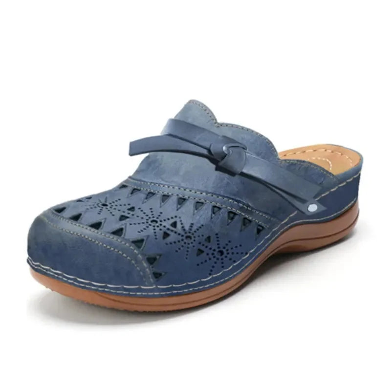 Dark Blue Women's Perforated Wedge Clogs — Indigo Cushioned Buckle-Strap Cutout - Front Full