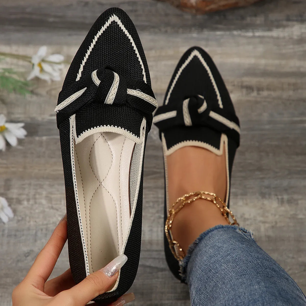 Black Women's Pointed Toe Ballet Flats — Violet Slip-On Bow-Knot Knit - Worn Close Up