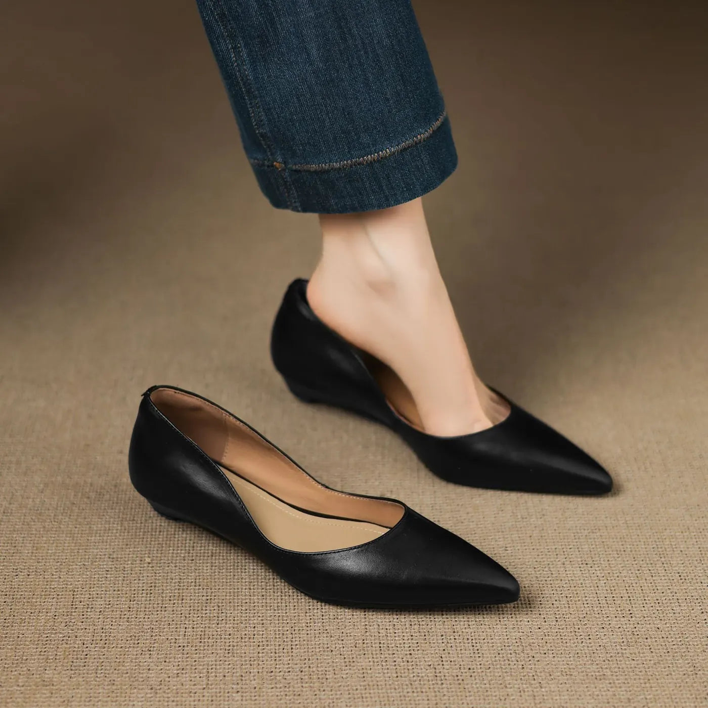 Black Women's Pointed Toe Leather Ballet Flats — Clara Everyday Low Wedge Slip-On - Worn Side View