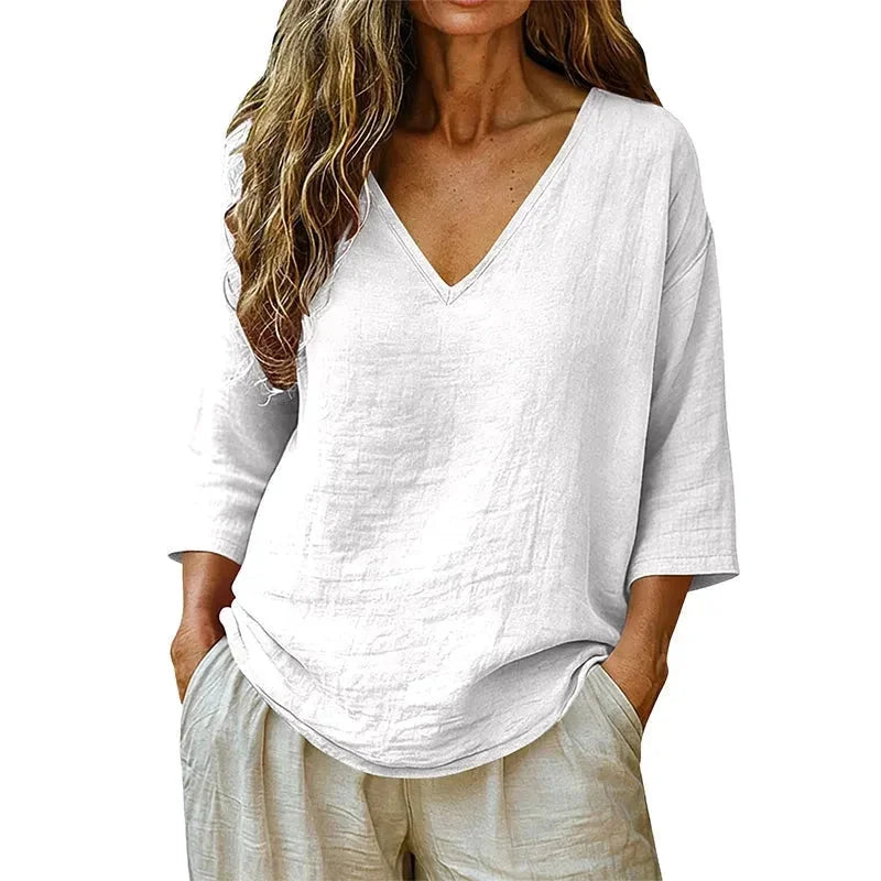 White Women's V-Neck Linen Blouse — Mabel Relaxed Curved-Hem Three-Quarter Sleeve - Studio Front