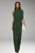 Green Women's Sleeveless Wide-Leg Jumpsuits — Mila Draped Mock-Neck Evening - Front Walking Pose