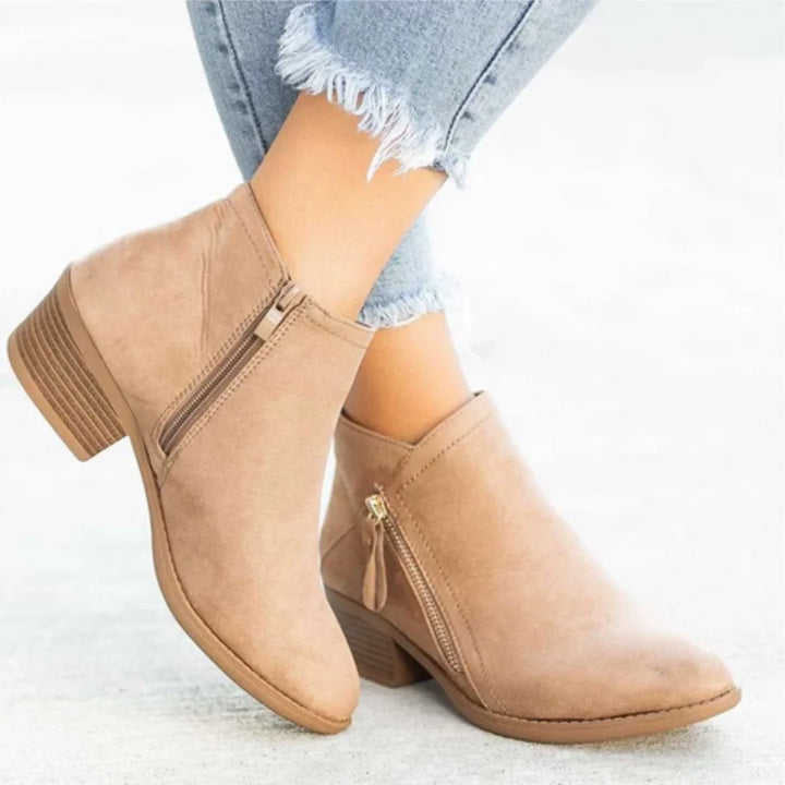 Beige Women's Pointed Toe Ankle Boots — Mia Suede Zip-Up Block Heel - Side View Worn