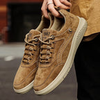 Brown Men's Casual Low-Top Sneakers — Zelda Suede Lace-Up Cushioned - Hand Holding Pair