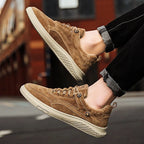 Brown Men's Casual Low-Top Sneakers — Zelda Suede Lace-Up Cushioned - Worn Jump Pose Side