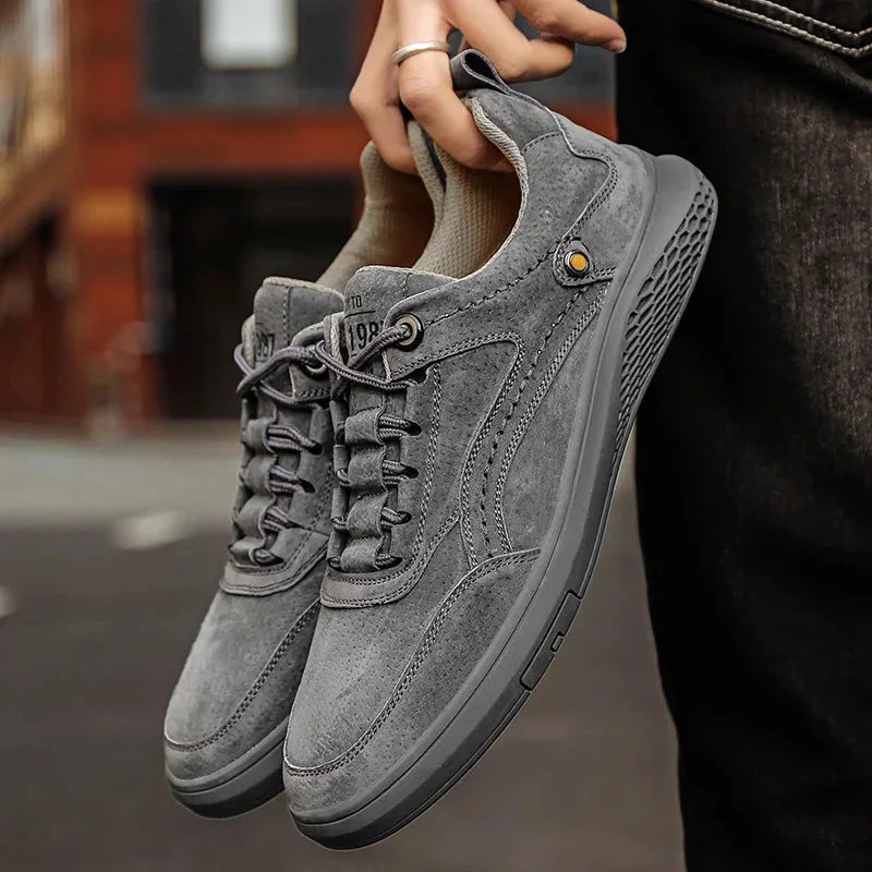 Gray Men's Casual Low-Top Sneakers — Zelda Suede Lace-Up Cushioned - Hand Holding Pair Outdoor