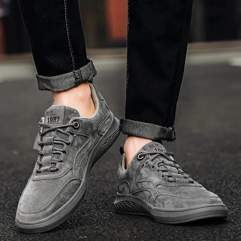 Gray Men's Casual Low-Top Sneakers — Zelda Suede Lace-Up Cushioned - Worn Lifestyle Street Pose