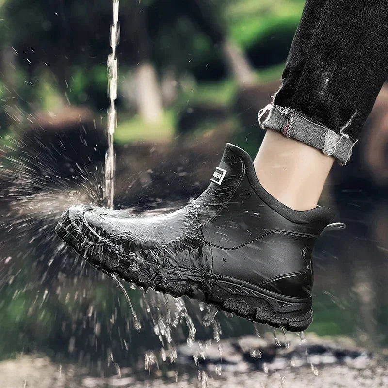 Black Women's Rain Boots — Celeste Rubber Waterproof Ankle - Worn Lifestyle