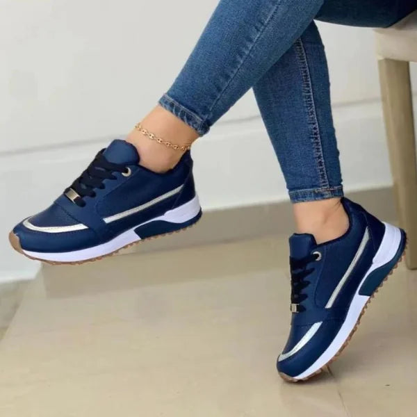Blue Women's Chunky Sneakers — Diane Faux Leather Lace-Up Wedge - Worn Lifestyle Seated