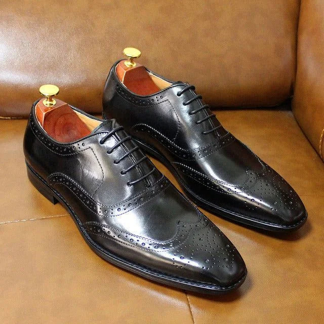Black Men's Leather Wingtip Oxford Shoes — Levi Cushioned Lace-Up Brogue - Sofa Side Pose